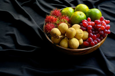 High angle view of grapes in bowl