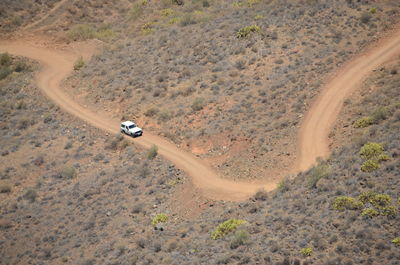 High angle view of car moving on road