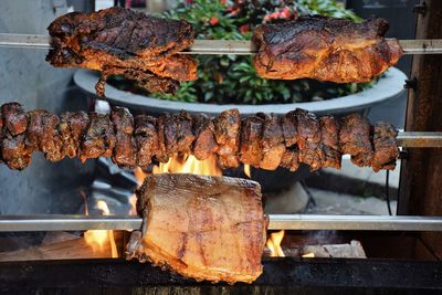Close-up of meat on barbecue grill