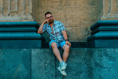 Portrait of man sitting on chair