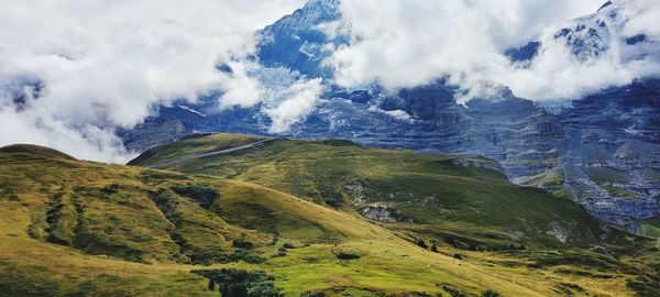 Scenic view of snowcapped mountains against sky