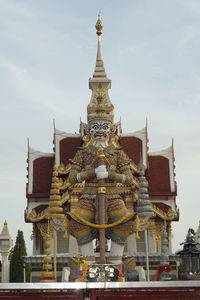 Low angle view of temple against building