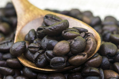 Close-up of coffee beans on table