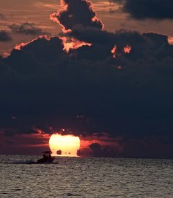 Scenic view of sea at sunset