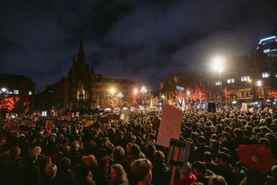 People on street at night