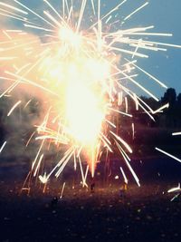 Firework display at night