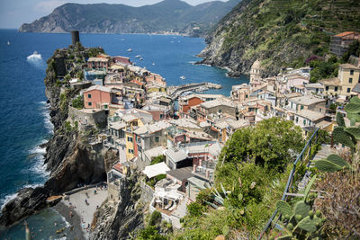 High angle view of town by sea