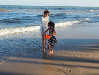 Full length of woman on beach