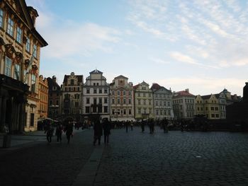 People in front of building