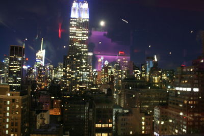 Illuminated cityscape at night