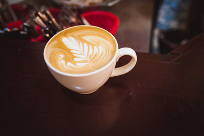 High angle view of coffee served on kitchen counter