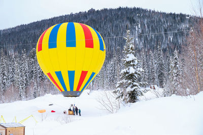Low angle view of hot air balloons against sky