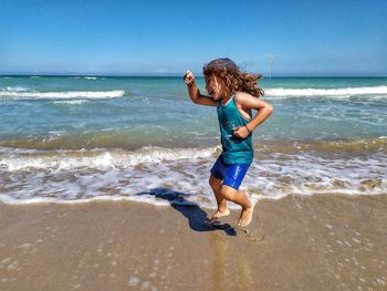 Full length of woman on beach