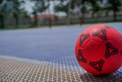 Close-up of soccer ball on land