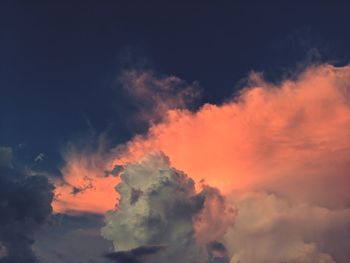 Low angle view of dramatic sky during sunset