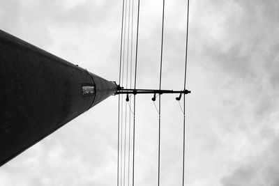 Low angle view of cables against sky