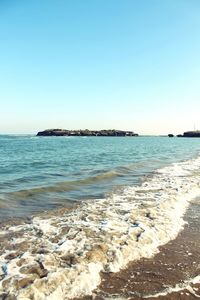 Scenic view of sea against clear sky