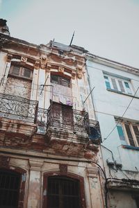 Low angle view of old building against clear sky