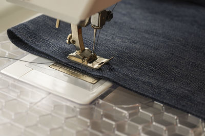 Close-up of fabric in sewing machine