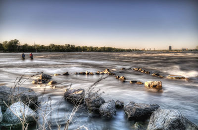 Scenic view of sea against clear sky