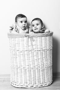 Portrait of cute girl in basket