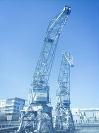 Low angle view of built structure against clear blue sky