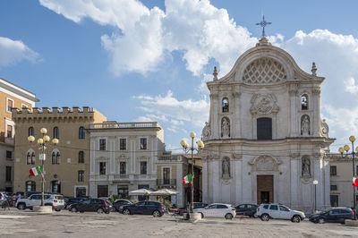 The beautiful piazza duomo in l'aquila with historic buildings and churches