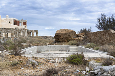 Old ruin building against cloudy sky