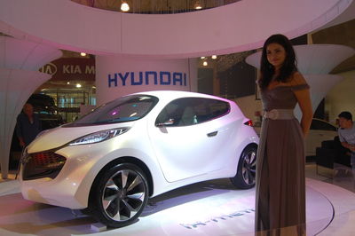 Portrait of woman standing in car