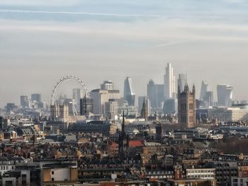 Modern buildings in city against sky