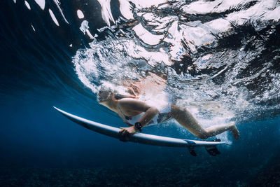 Man swimming in sea