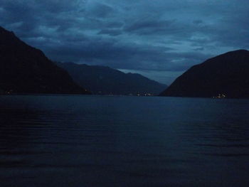 Scenic view of sea against sky at dusk