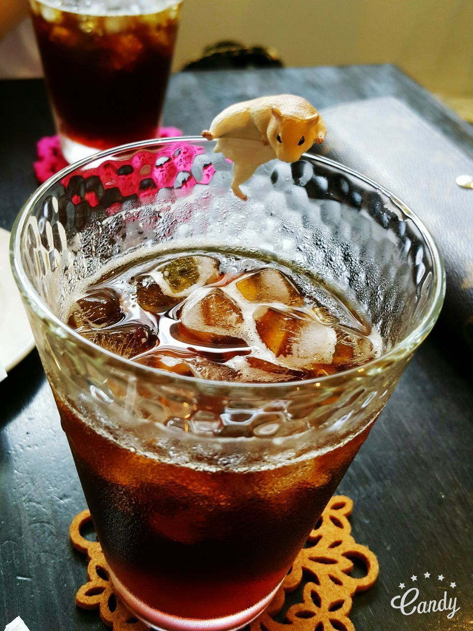 CLOSE-UP OF COCKTAIL ON TABLE