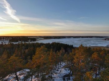 Scenic view of lake against sky during autumn