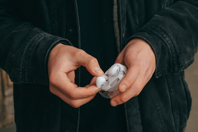 Close-up of boy holding hands