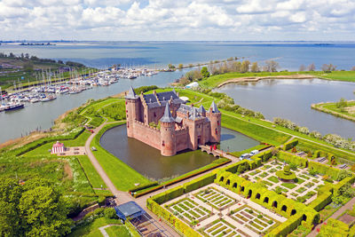 Aerial from the medieval muiderslot castle at the ijsselmeer in the netherlands