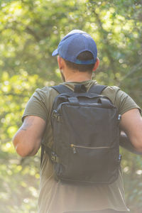 Rear view of woman standing outdoors