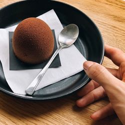 High angle view of person having breakfast on table