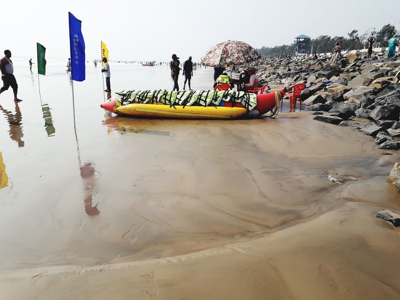 PEOPLE ENJOYING ON BEACH