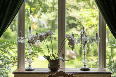 Close-up of small glass vase on table