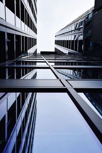 Low angle view of modern buildings against sky