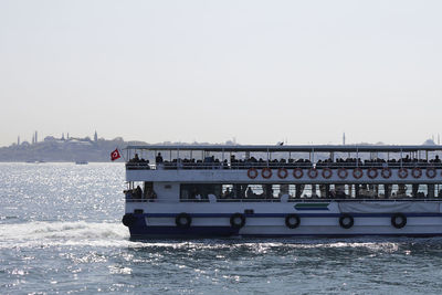 Boat in sea against clear sky