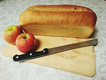 Close-up of apples on cutting board