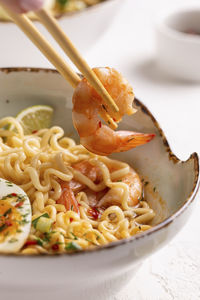 Traditional asian food, ramen soup with shrimps