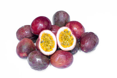 Directly above shot of fruits in plate against white background