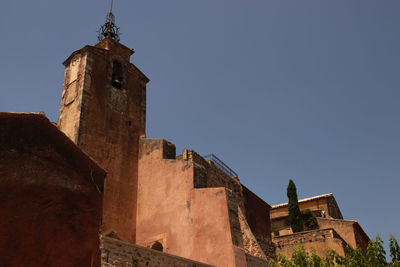 Low angle view of old building against sky