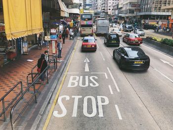 High angle view of vehicles on road in city