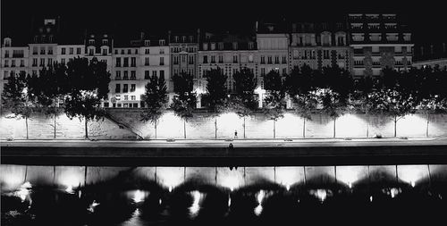 Buildings in city at night