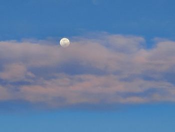 Low angle view of moon against sky