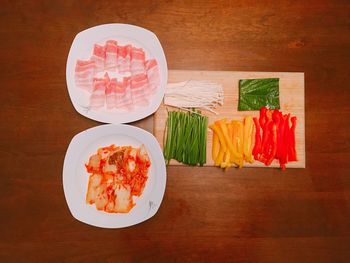 High angle view of multi colored candies on table